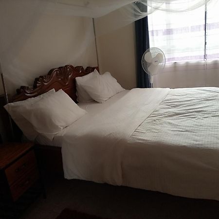 Jkia Homestays Nairobi Habitación foto