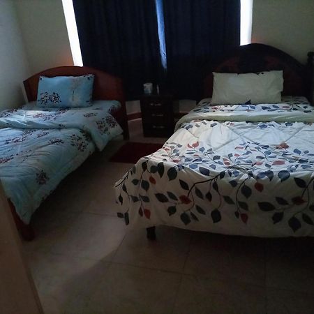 Jkia Homestays Nairobi Habitación foto