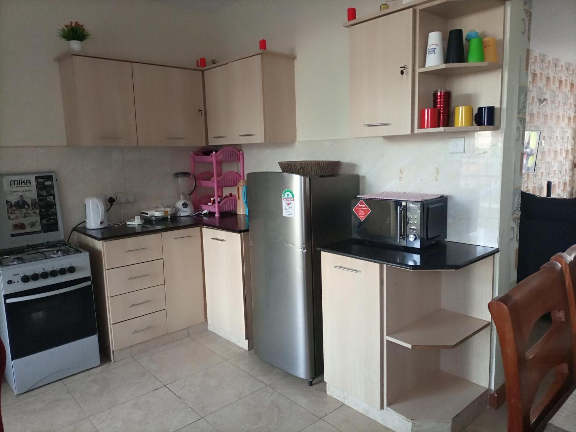 Jkia Homestays Nairobi Habitación foto