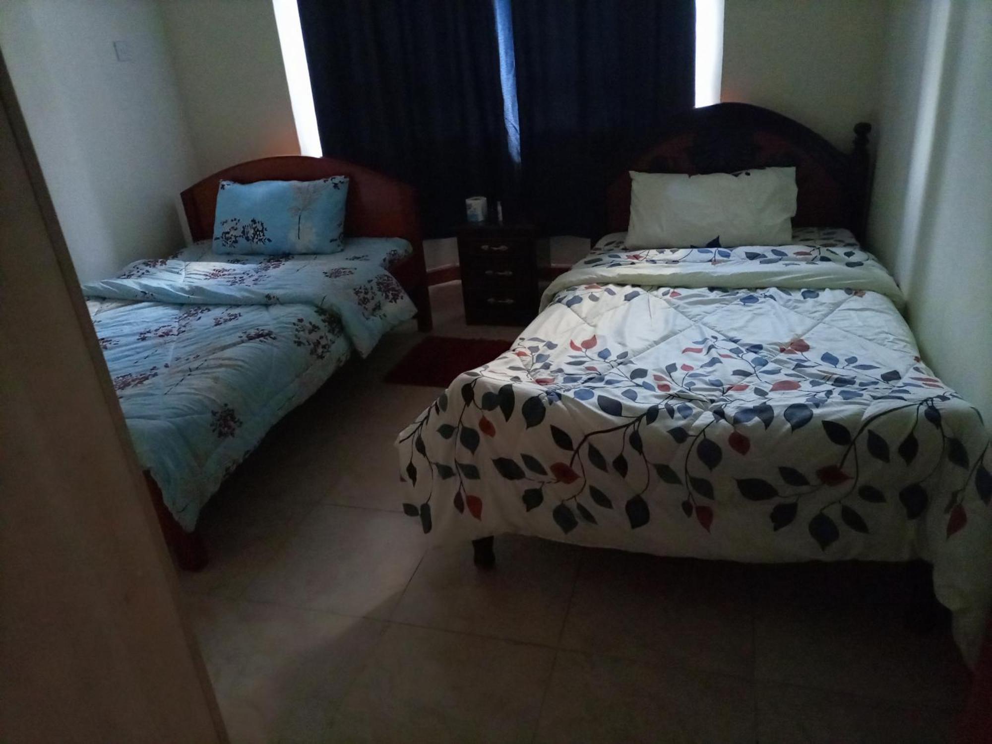 Jkia Homestays Nairobi Habitación foto
